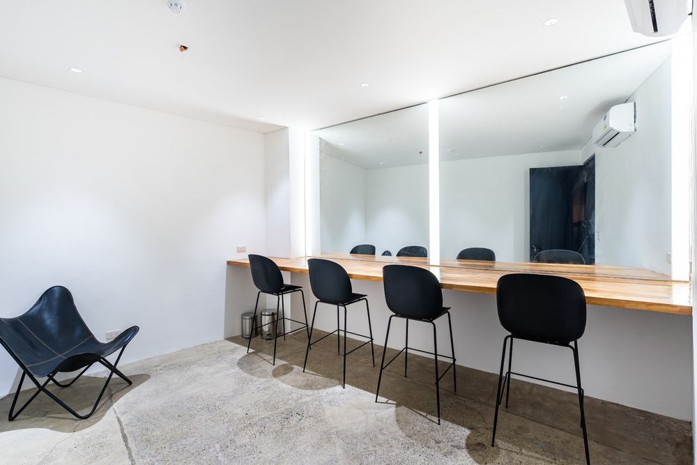 The dressing room with a lit mirror counter